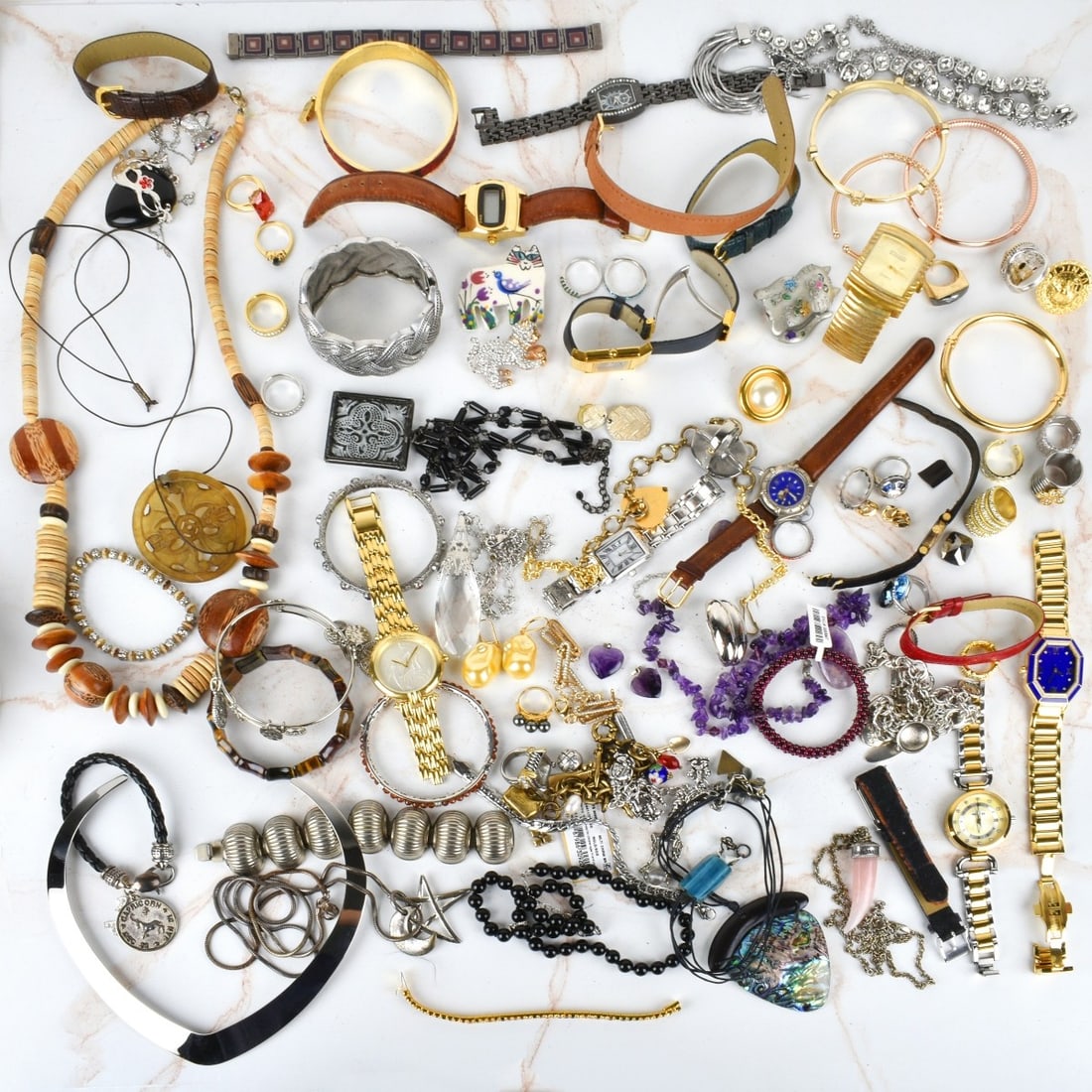 Collection of Vintage Costume Jewelry: Collection of Vintage Costume Jewelry Including Necklaces, Bracelets, Watches, Rings, Pendants and Earrings. A few signed pieces. Condition: Good condition. Please note the galley does not warranty th