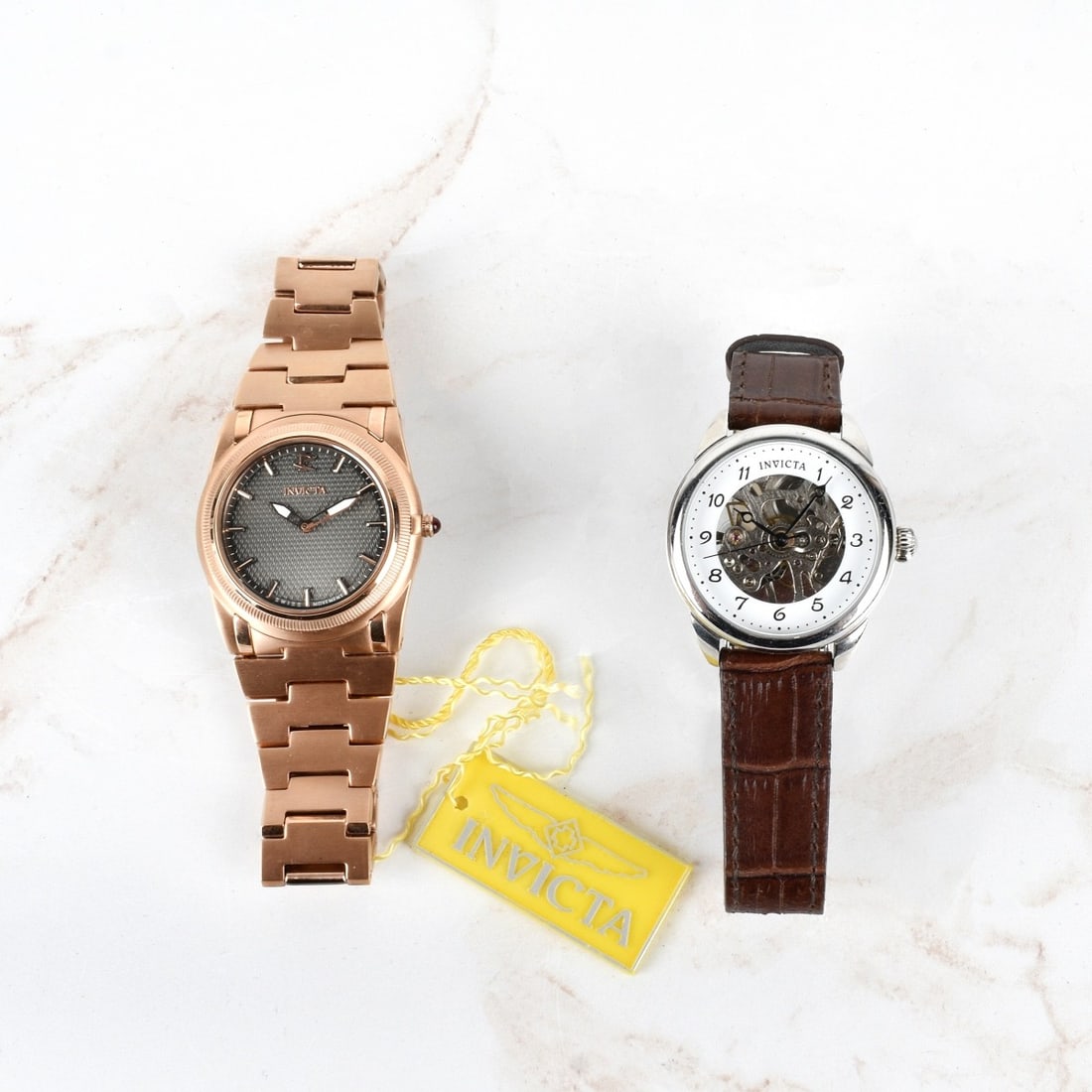 Invicta Men's Wrist Watches: Invicta Men's Wrist Watches. Leather bracelet measures: 9-1/4" L, gold tone bracelet measures: 8-3/4" L. Condition: Like new condition. Please note the galley does not warranty the running condition o