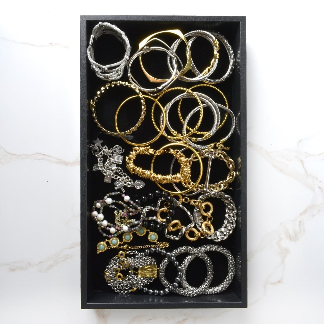 Collection of Fashion Jewelry: Collection of Fashion Jewelry. Consisting of twenty-nine (29) bracelets with various accents, color stones, hardstones and more. Various makers and styles. Condition: Good condition. Estimate: $50.00 