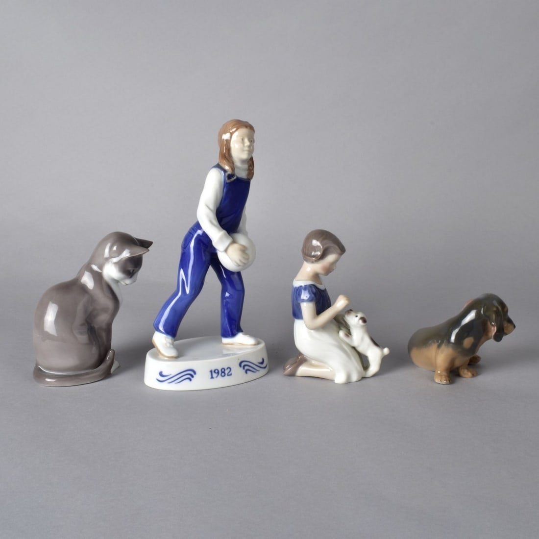 Four Porcelain Figurines (1 of 4)