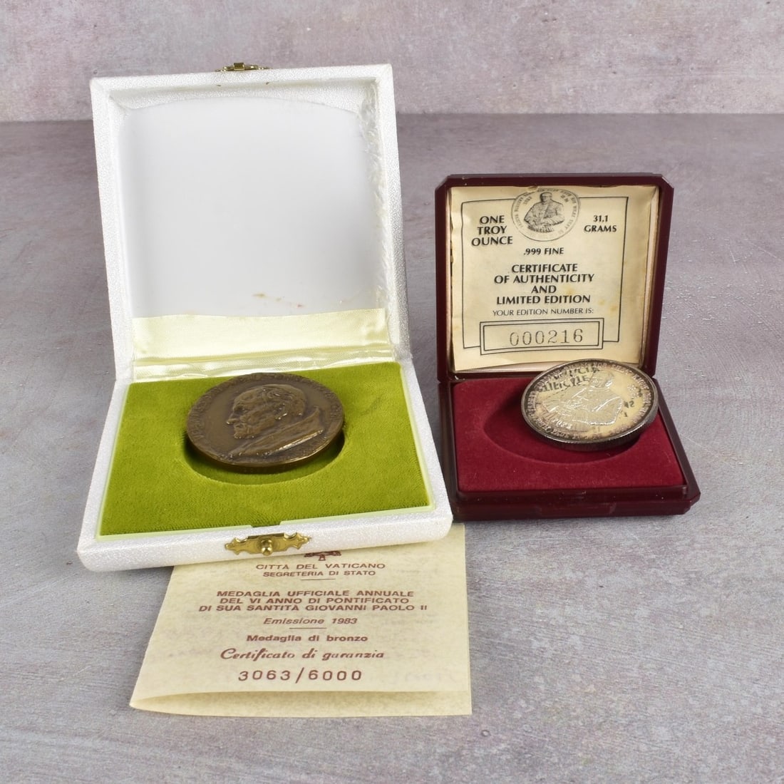 Silver and Bronze Medals John Paul II: Silver and Bronze Medals of John Paul II. The silver is 1 toz of .999 31.1gr. It comes with the original box and COA . The other is a Vatican released bronze coin commemorating the sixth year Pope Joh
