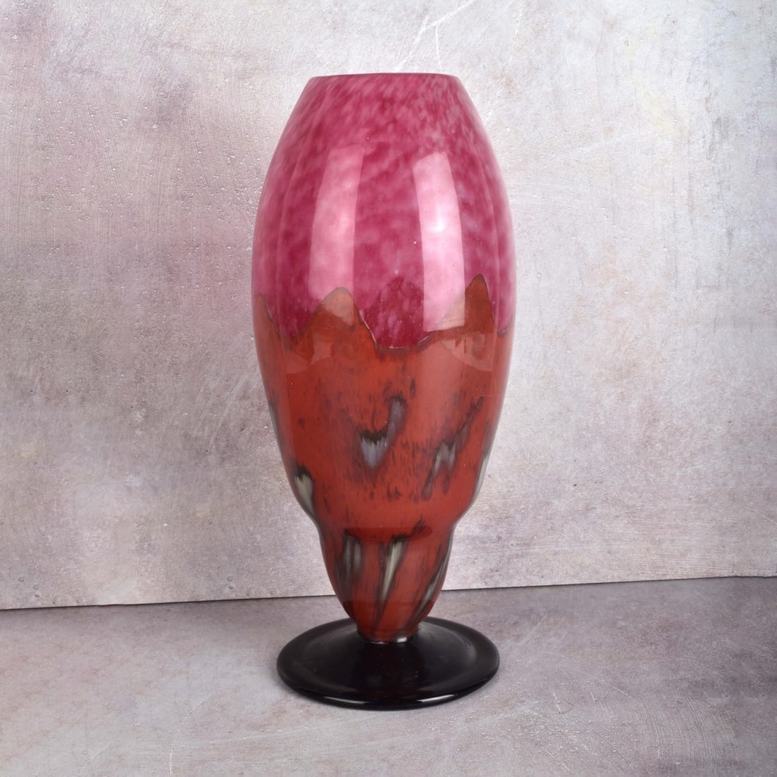 Charles Schneider, French (1881-1953): Charles Schneider, French (1881-1953) Conical Shaped Vase in Yellow and Pink Flame Worked Glass on a Violet-Black Footed Base. Signed "Schneider France" the base. Measures: 12-1/4" H, 5" Dia. Kodner G