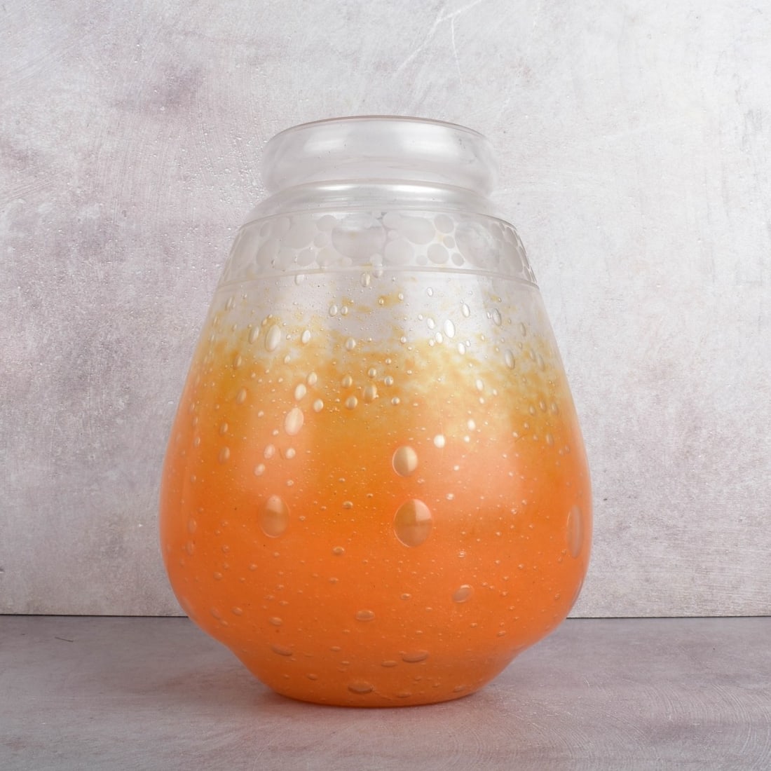 Charles Schneider, French (1881-1953): Charles Schneider, French (1881-1953) French Art Glass Vase. Orange to clear glass with a cut glass dot pattern to the top portion and an internal bubble effect. Signed "Schneider France" in script to