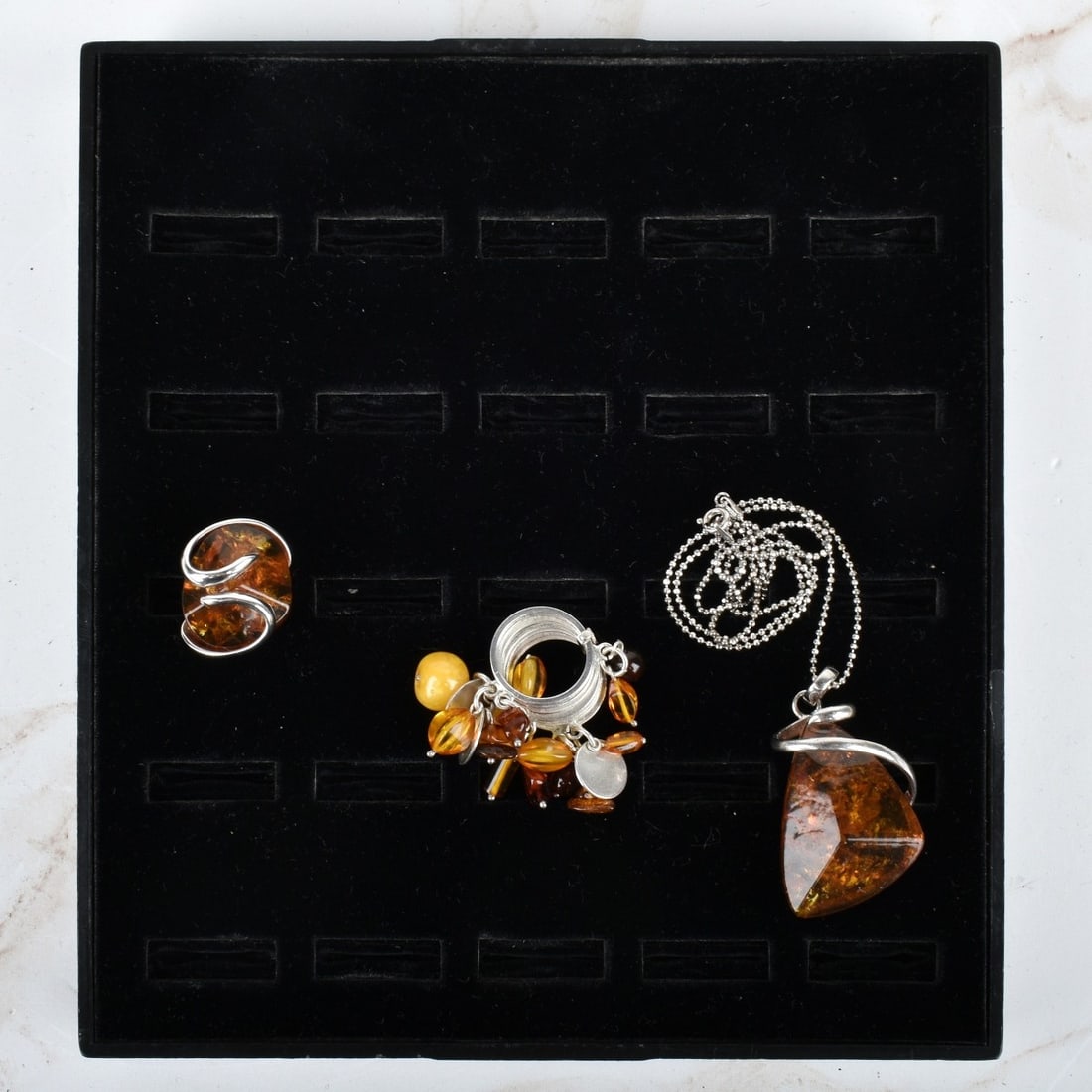 Collection of Amber and Sterling Silver Jewelry (1 of 1)