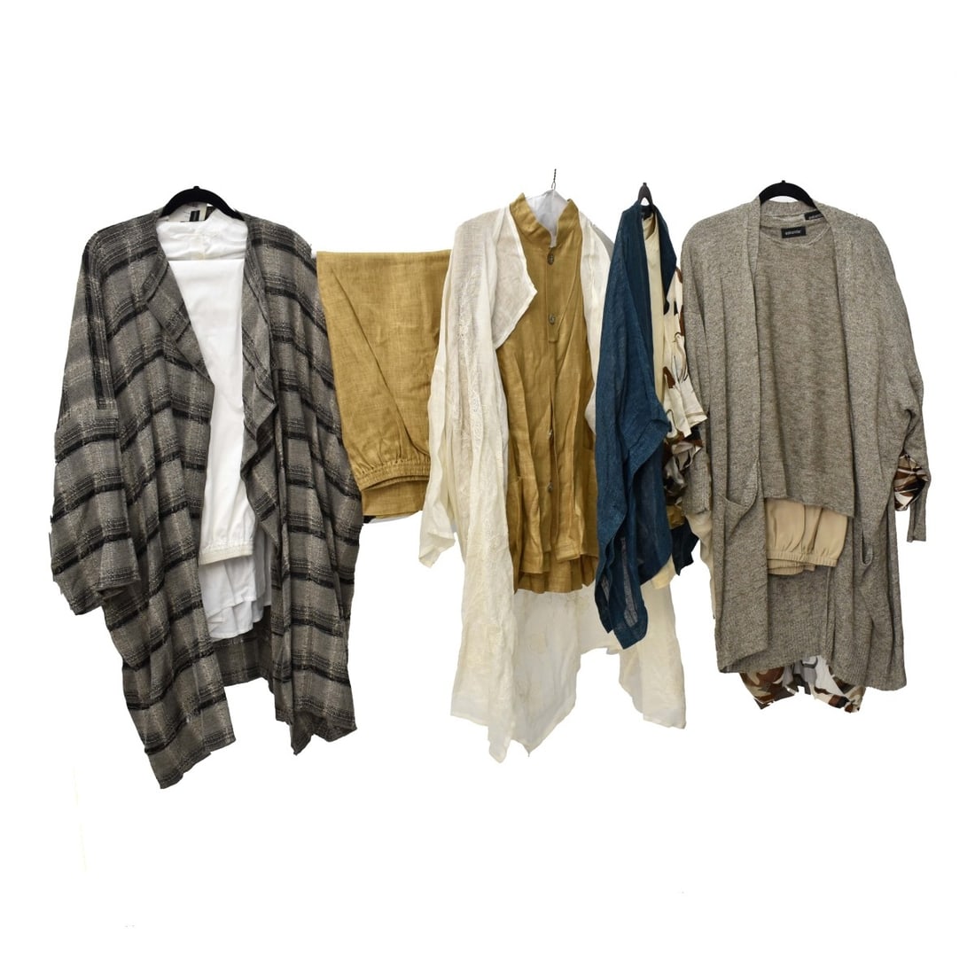 Five Eskandar Three Piece Clothing Sets: Five (5) Eskandar Three (3) Piece Clothing Sets (15pcs). Each contains a wrap or jacket, a pair of pants and a top. One in this lot still have tags of $1275.00 brown wrap, blue pants $585.00 top. Most