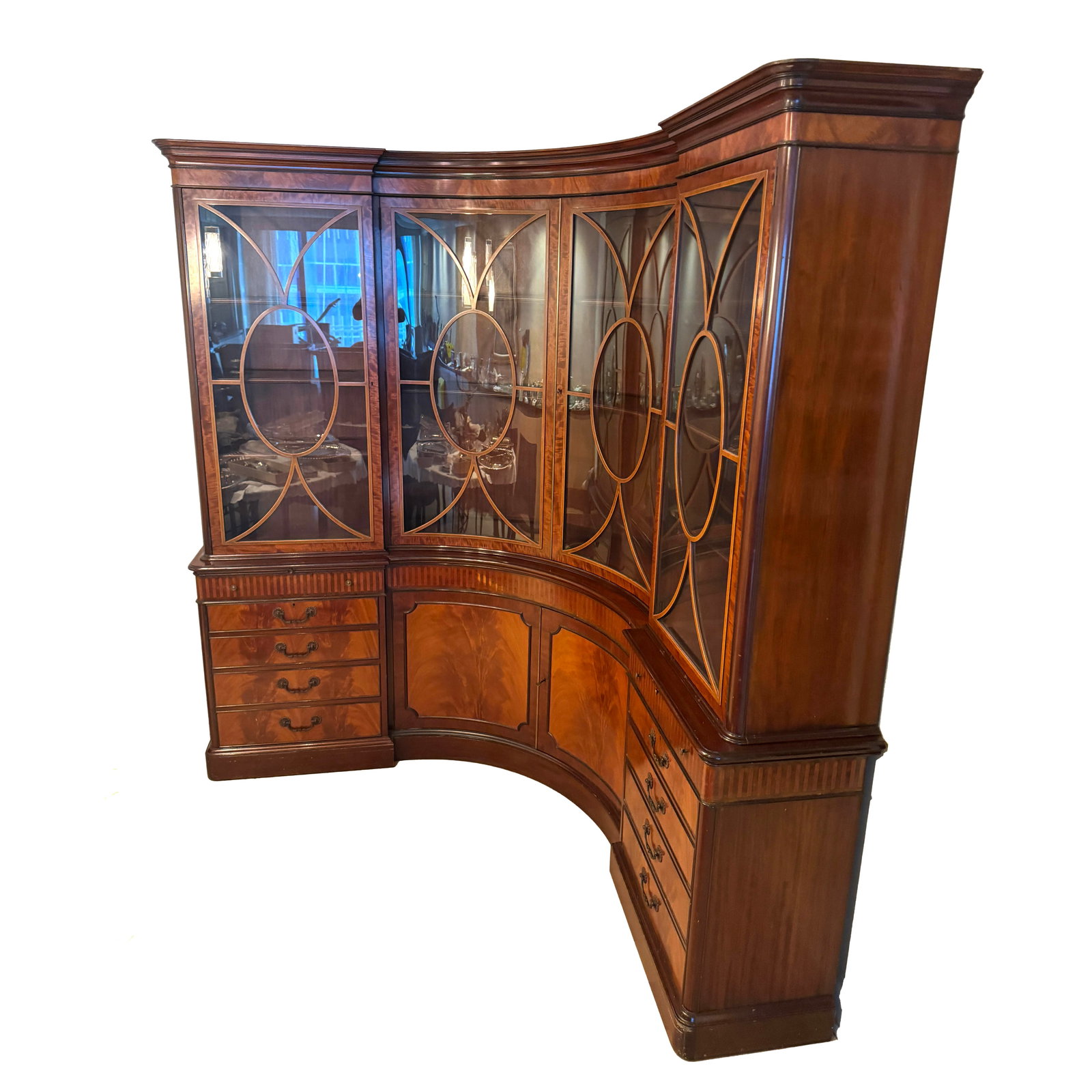 Vintage Schmieg and Kotzian Breakfront: Vintage Schmieg and Kotzian Mahogany Curved Breakfront with an Attached Plate Reading " Schmieg & Kotzian, New York". Measures: 93" H., 67" W., (one side), 67" W., (second side), 15" D. Kodner Galleri