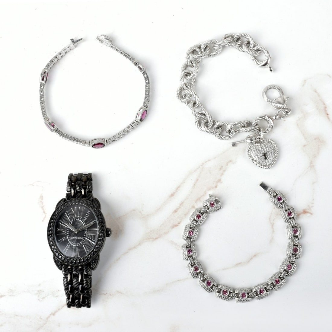 Judith Ripka Jewelry: Vintage Judith Ripka Jewelry. To include three sterling silver link bracelets accented with cubic zirconias and color stones together with a black stainless steel watch with black cubic zirconias. Eac