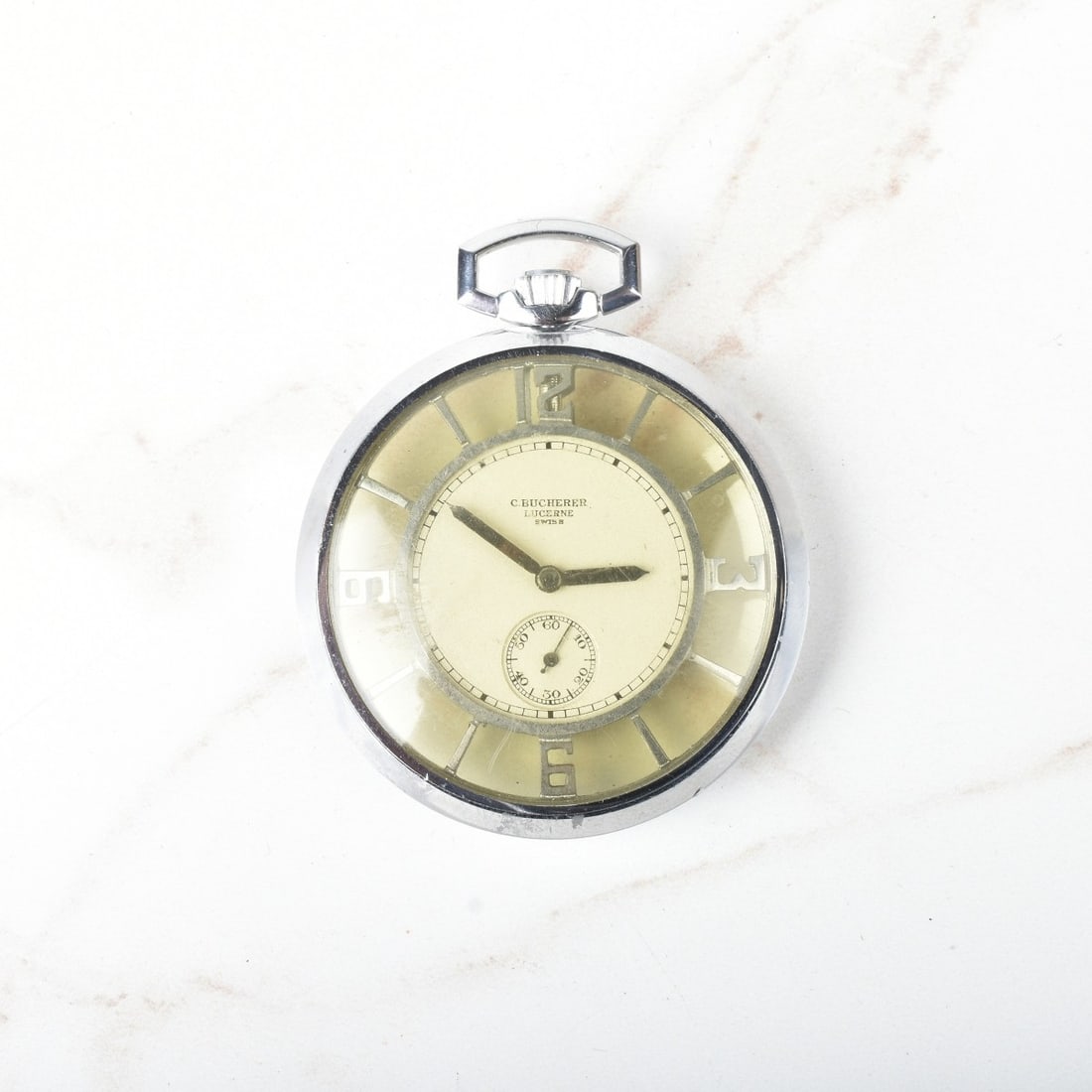 Rolex / C. Bucherer Pocket Watch: Vintage Rolex / Carl Bucherer Stainless Steel Double Skeletonized Pocket Watch, White Dial. Swiss fifteen jewel manual wind movement. Case measures 41mm. Kodner Galleries offers phone and absentee bid