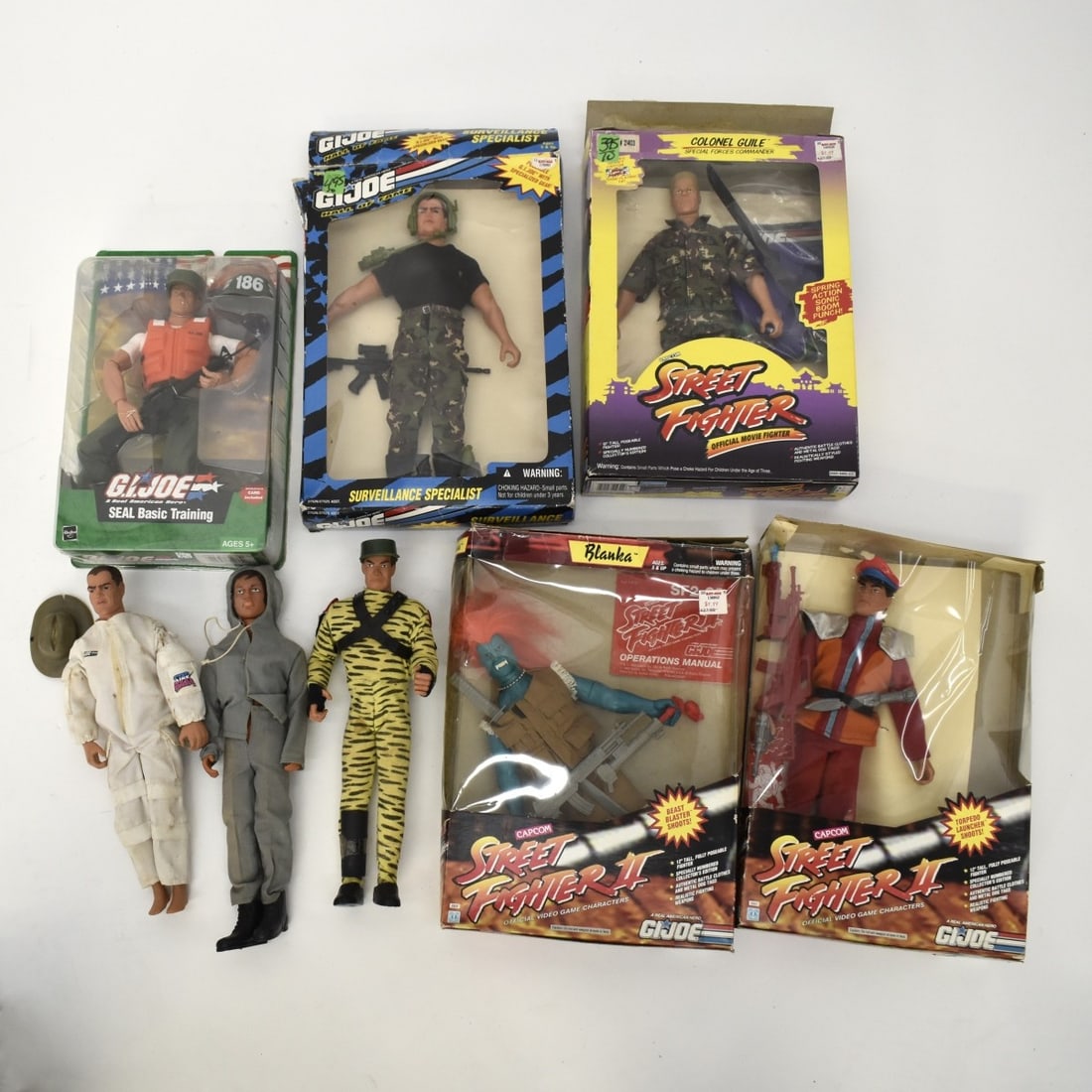 Vintage G. I. Joe Figurines: Vintage G. I. Joe Figurines, three loose, rest in original packaging. Kodner Galleries offers phone and absentee bidding at a low, flat 21% buyer’s premium without surcharge or hidden fees. For info