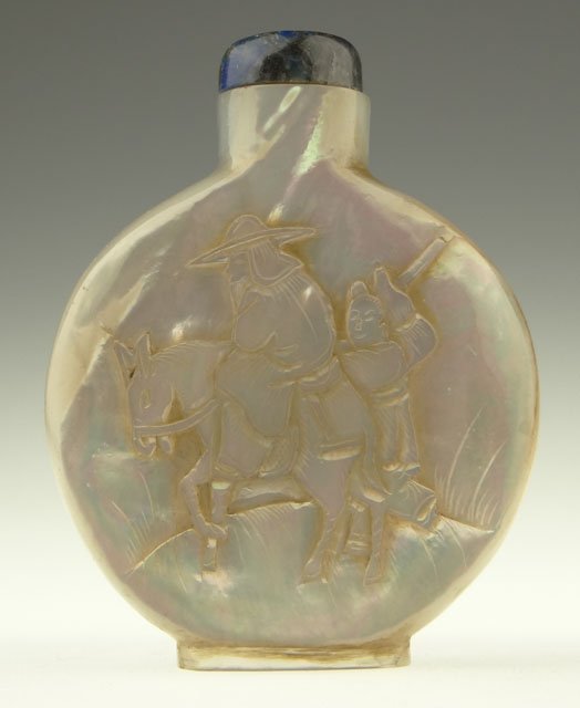 19th Century Mother of Pearl Snuff Bottle with Car: 19th Century Mother of Pearl Snuff Bottle with Carving on Each Panel in Relief and Lapis Stopper. From the Collection of a Founding Member of the International Chinese Snuff Bottle Society. Unsigned. 