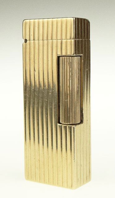 Dunhill Style 14 Karat Yellow Gold Lighter with th: Dunhill Style 14 Karat Yellow Gold Lighter with the Name "Jerry" Inscribed on Top. Unsigned. Good to Very Good Condition. Weighs 90.6 Grams or 58.2 Pennyweights. Measures almost 2-5/8 Inches Tall and