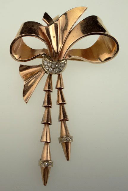 Retro Diamond, 14 Karat Pink and Yellow Gold Lady': Retro Diamond, 14 Karat Pink and Yellow Gold Lady's "Ribbon and Tassel" Brooch/Pin. Unsigned. Good to Very Good Condition. Weighs 20.2 Grams or 12.9 Pennyweights. Measures 3-3/8 Inches Tall and 2-1/8