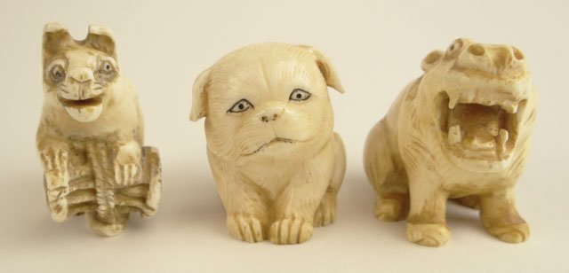 Three (3) 20th Century Japanese Carved Ivory Netsu: Three (3) 20th Century Japanese Carved Ivory Netsuke Including a Hippo, a Cat and a Dog. Each Signed. Good Condition or Better. Hippo Measures 1-1/2 Inches Tall and 1-3/4 Inches Long. This item will o