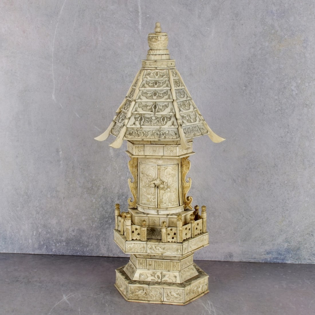 Antique Religious Chinese Carved Bone Pagoda: Antique Religious Chinese Carved Bone Pagoda Sculpture. Measures: 15-1/4" H., 5-1/2" W., 4-1/2" D. Kodner Galleries offers phone and absentee bidding at a low, flat 21% buyer’s premium without surch