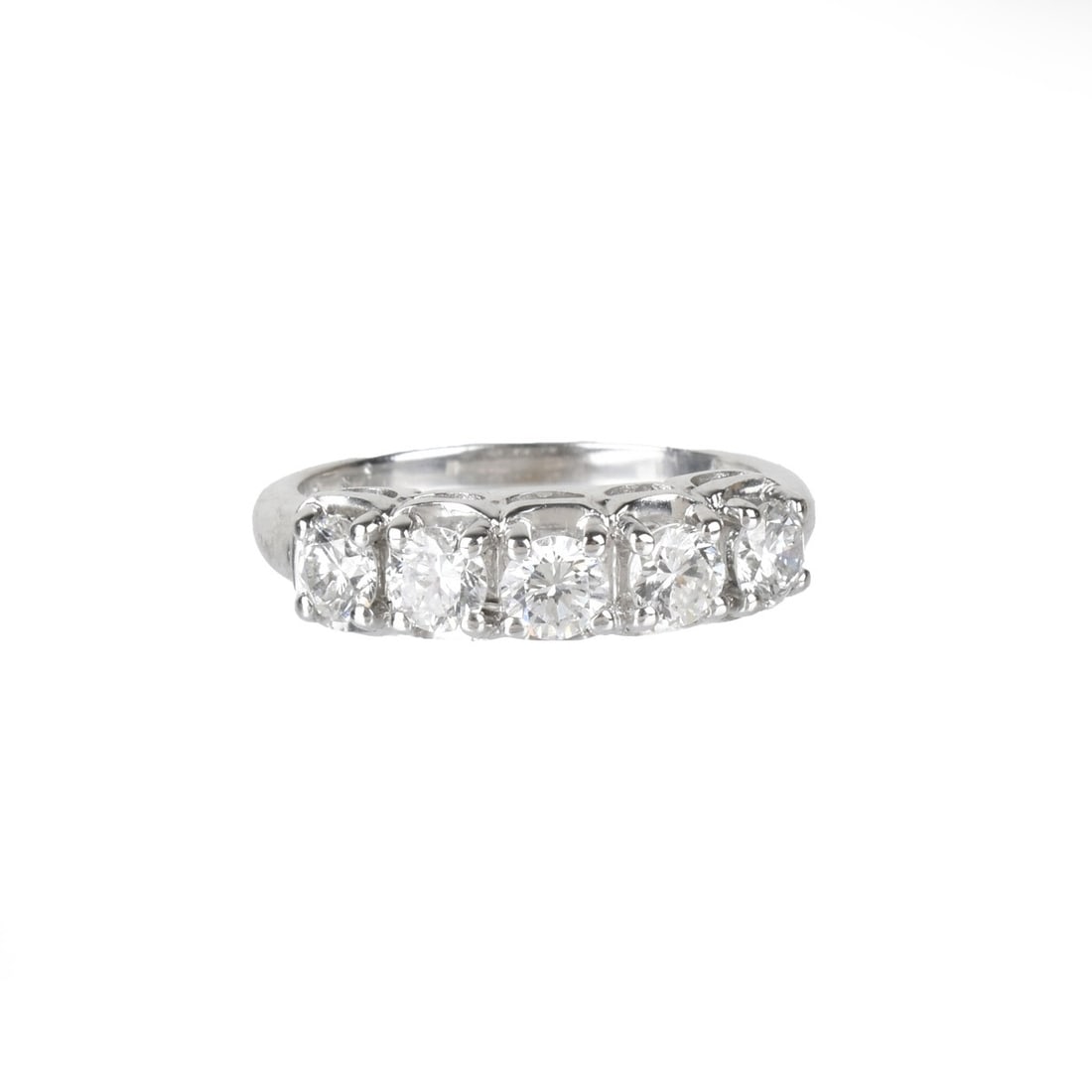 Diamond and 14K Ring: Vintage Approx. 1.0 Carat TW Five Round Brilliant Cut Diamond and 14 Karat White Gold Ring / Band. Diamonds F-G color, VS1-SI1 clarity. Stamped 14K. Ring size 6. Approx. weight: 3.38 grams. Condition: