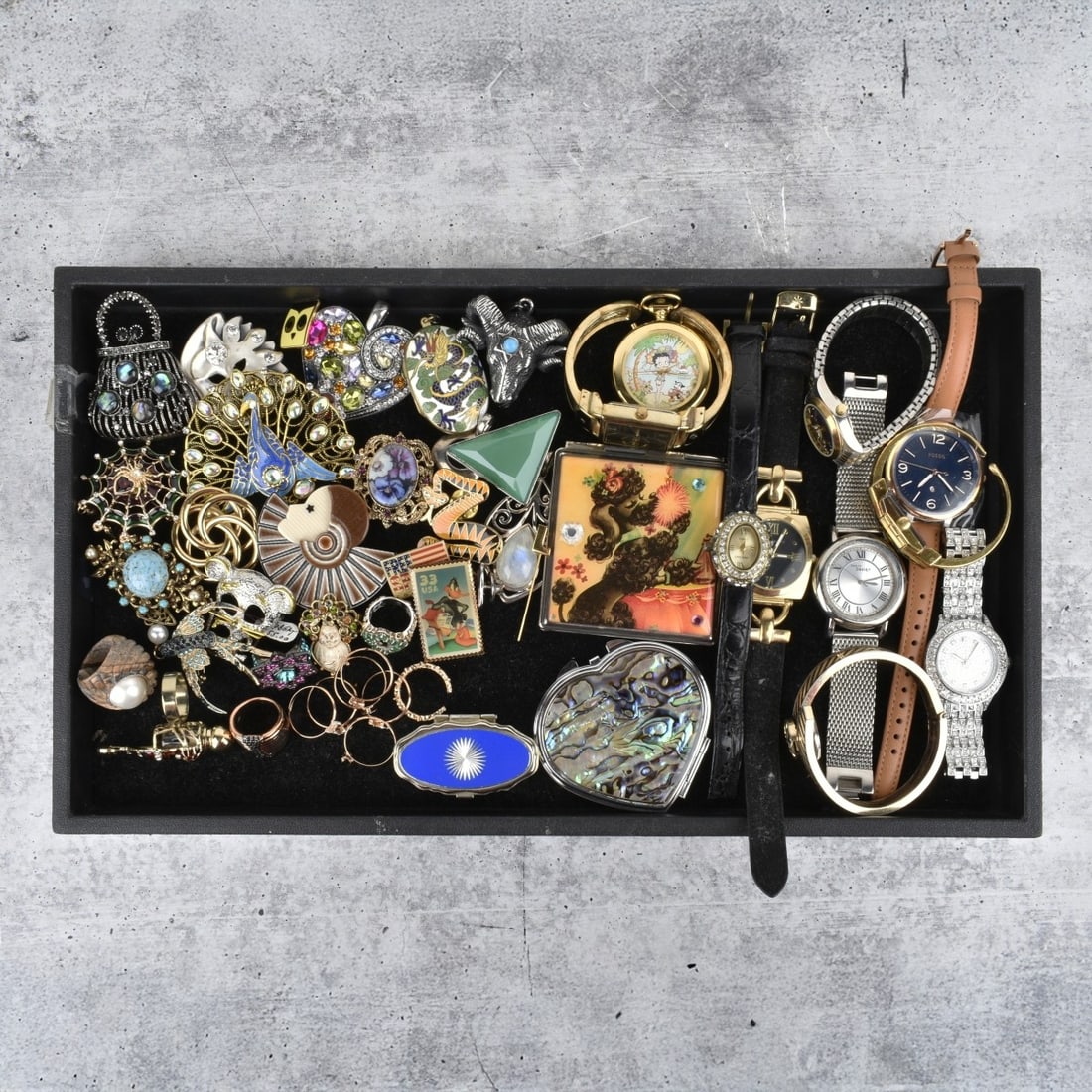 Collection of Fashion Jewelry & Watches: Collection of Fashion Jewelry and Watches. to include pins, pendants, rings, compacts, pill box and watches. One Rado bracelet watch with manual wind movement, remaining seem to be quartz movements. A