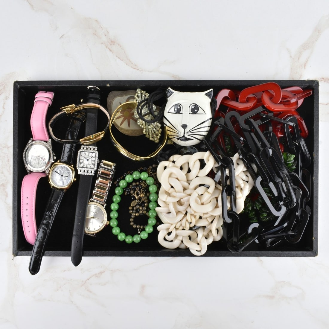 Fashion Jewelry: Tray Lot of Vintage Fashion Jewelry. To include watches, necklaces, bracelets and pins. Various style and makers. Watches with quartz movements. Kodner Galleries offers phone and absentee bidding at a