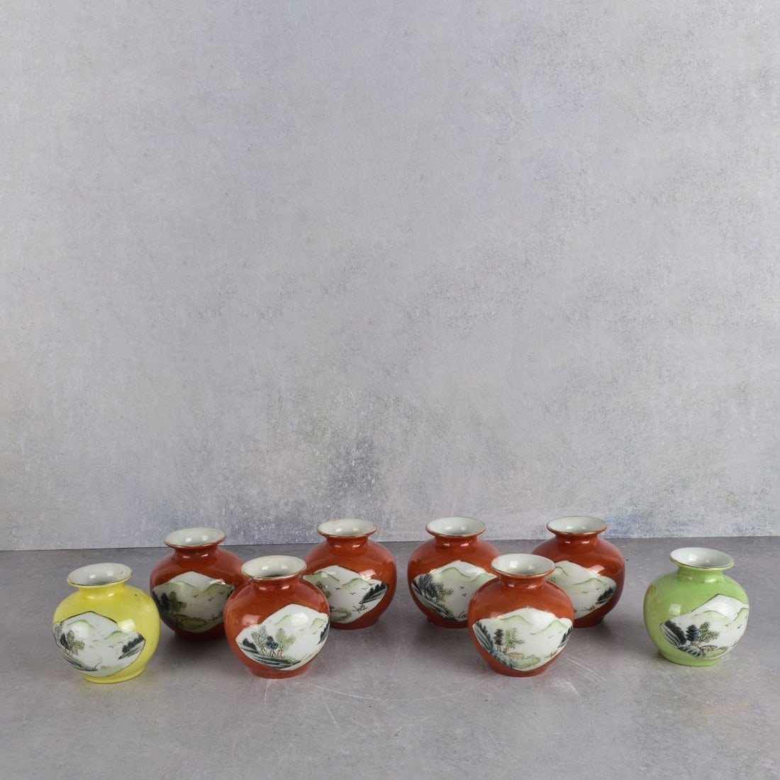 Modern Chinese Porcelain Jars: Collection of Eight (8) Modern Chinese Porcelain Jars. Various color grounds, each marked to the bottom. Measures: 3-3/8" H., 3-1/8" Dia. Kodner Galleries offers phone and absentee bidding at a low, f