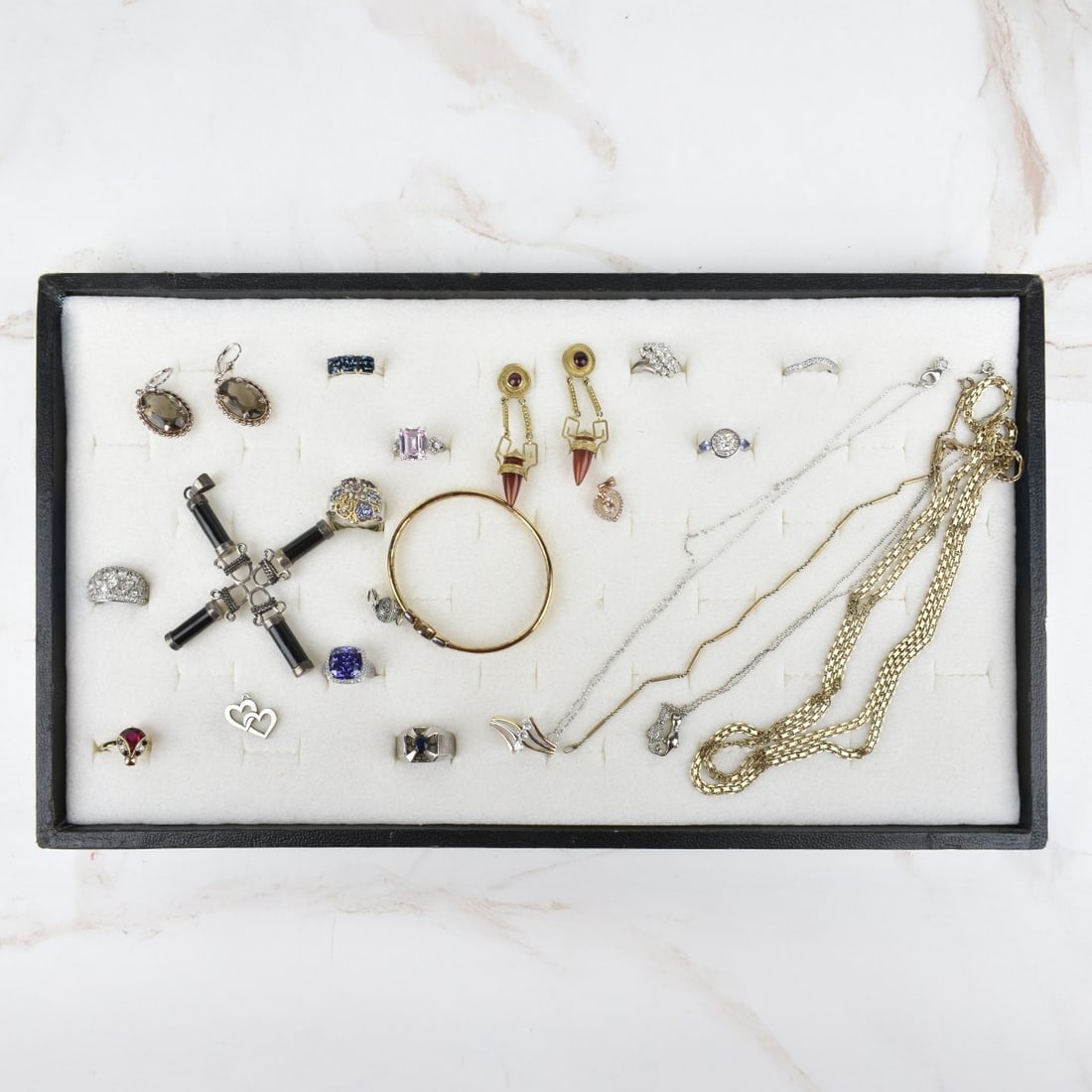 Silver Fashion Jewelry: Collection of Vintage Sterling Silver Fashion Jewelry. To include necklaces, one bracelet, rings, earrings and pendants. Variously accented with faux diamonds and color stones. Various styles and make
