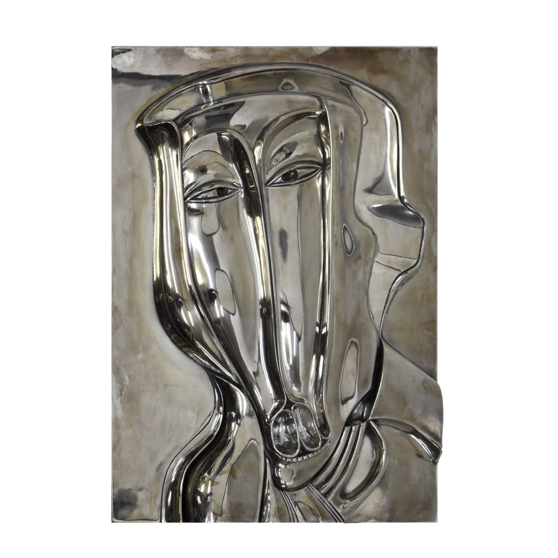 Mihail Chemiakin, Russian (b. 1943): Mihail Chemiakin, Russian (b. 1943) Surrealist Cast Silvered Face Plaque. Artist signed and dated 1987 and numbered E.A. 1/4 to bottom edge. Measures: 18-1/2" H, 13" W, 1-3/4" D. Kodner Galleries offe