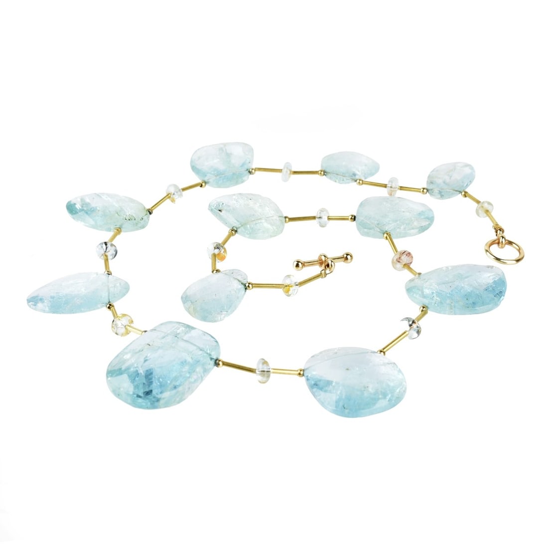 Quartz and 14K Necklace.: Vintage Faceted Blue Quartz and 14 Karat Yellow Gold Necklace. Largest quartz measures 32 x 24mm. Necklace measures 20" L. Approx. weight: 86.73 grams. Kodner Galleries offers phone and absentee biddi