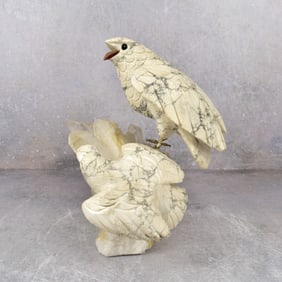 Vintage Carved Stone Birds on a Quartz Rock