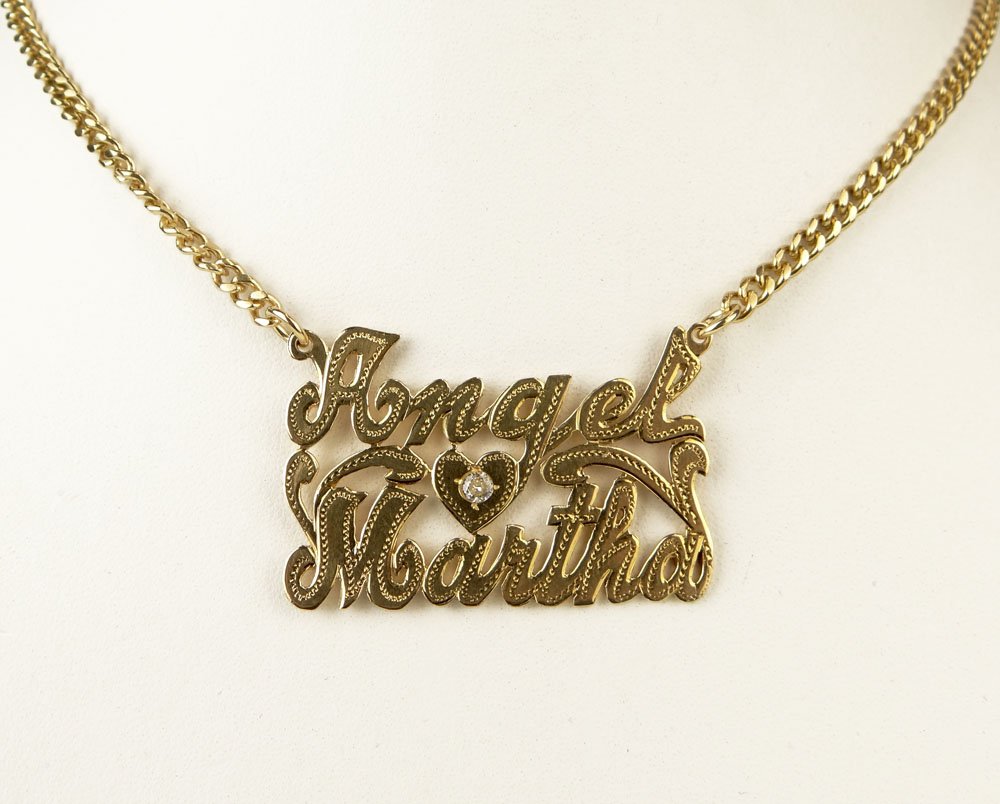 14 Karat Yellow Gold "Angel Loves Martha" Necklace with: 14 Karat Yellow Gold "Angel Loves Martha" Necklace with Diamond. Signed Stamped 14k. Good to Very Good Condition. Weighs 18.1 Pennyweights. Measures 25 Inches Long. Shipping $20.00