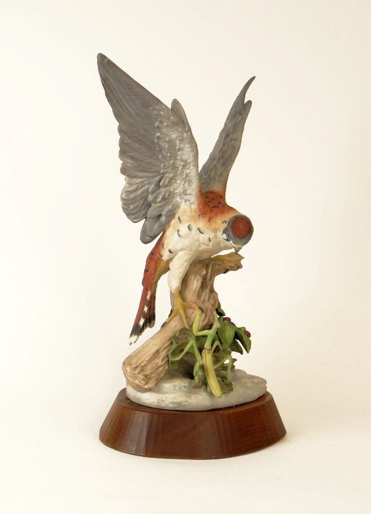 1977 Cybis Bisque Porcelain "Kestrel" Figure Hand Paint: 1977 Cybis Bisque Porcelain "Kestrel" Figure Hand Painted and Attached to Wooden Base. Signed Rear of Sculpture. Very Good Condition. Measures almost 18-1/4 Inches Tall Including Base. Shipping $100.0