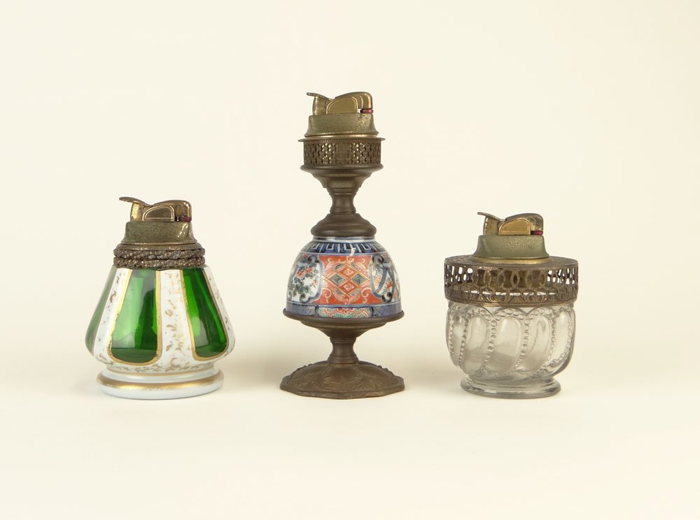 Collection of Three (3) Tabletop Lighters. One (1) Imar: Collection of Three (3) Tabletop Lighters. One (1) Imari, One (1) Bavarian Glass and the Last a Molded Glass Lalique Style Lighter. Good Condition or Better. Taller Measures 6-1/4 Inches. Shipping $32