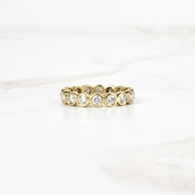 Diamond and 18K Eternity Band