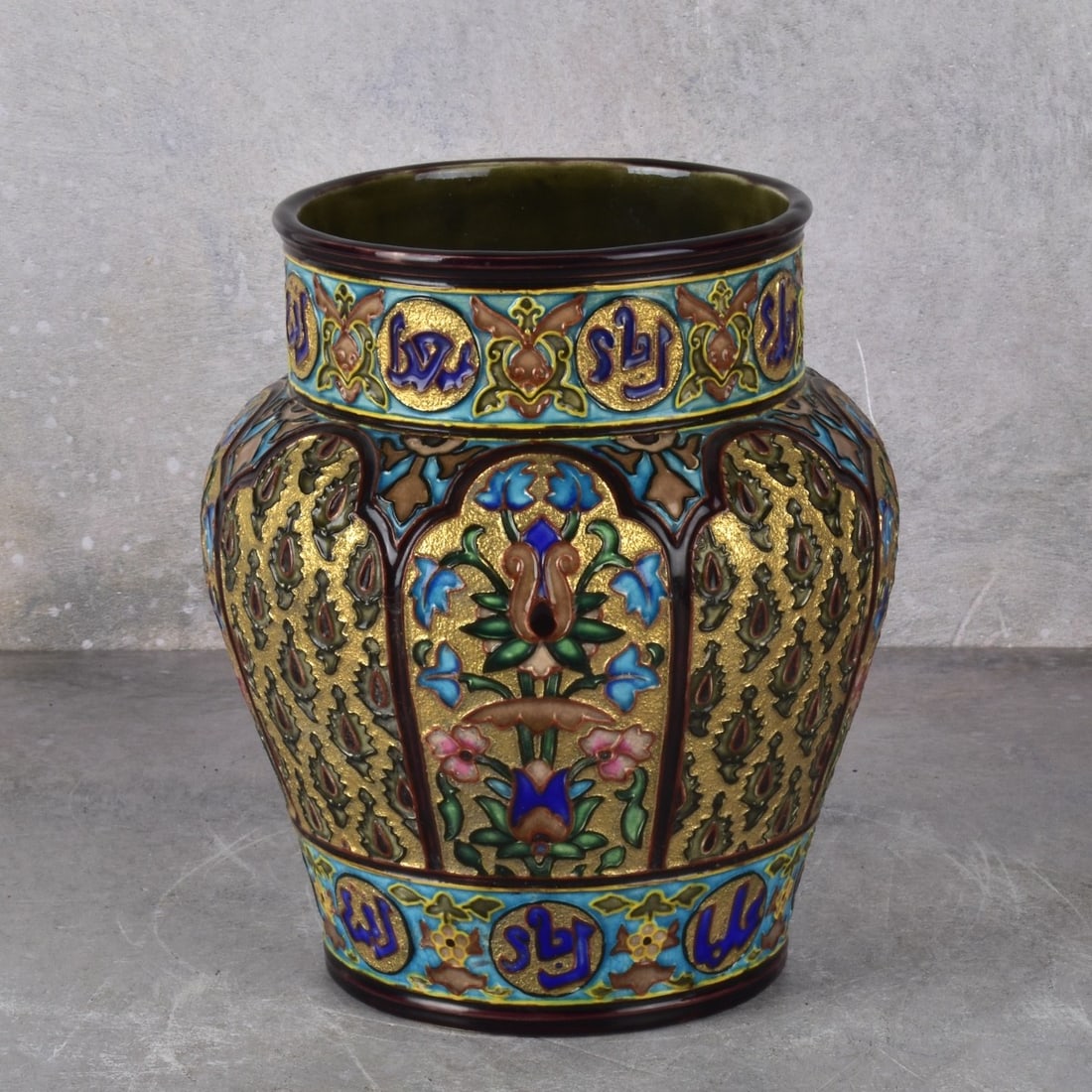 Vintage Islamic Enamel Porcelain Vase: Vintage Islamic Enamel Porcelain Vase by Seyda Aksu. Measures: 7-3/4" H, top measures: 5-1/8" Dia., bottom measures: 4-1/2" Dia. Kodner Galleries offers phone and absentee bidding at a low, flat 21% b