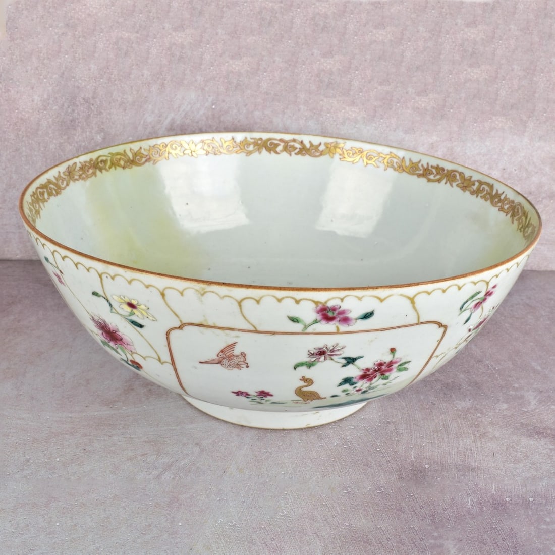 Famille Rose Decorated Punch Bowl: Famille Rose Decorated Punch Bowl. Hand painted, early 19th century. Measures; 5" High, 12"n Diameter. Kodner Galleries offers phone and absentee bidding at a low, flat 21% buyer’s premium without s