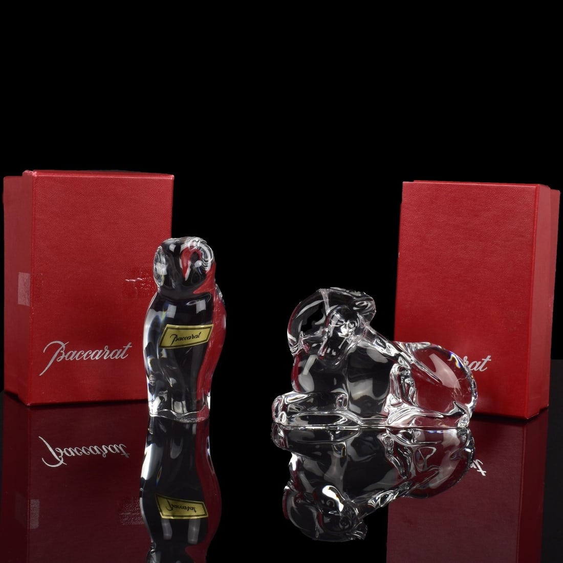 Baccarat France Crystal Figurines: Two (2) Baccarat France Crystal Figurines. Both properly marked to the bottom, comes with Baccarat boxes. One (1) figure of a recumbrant unicorn, measures: 3-1/4" High, 4-1/2" Wide, 1-3/4" Wide, one (
