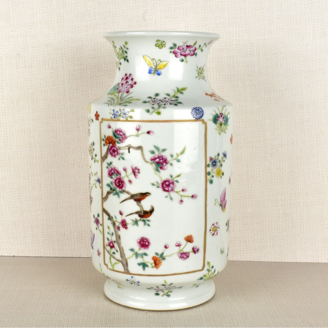 Chinese Porcelain Vase: Large Chinese Guangxu style Famille Rose Porcelain Vase. Six character marks to base. Measures 11-7/8" High, 6-1/2" Wide. Kodner Galleries offers phone and absentee bidding at a low, flat 21% buyer’