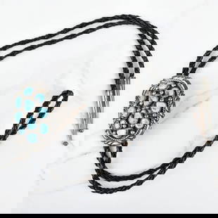 Native American Turquoise & Silver Bolo Tie: Vintage Native American Turquoise Nugget and Sterling Silver Bolo Tie with Braided Leather. Signed "S" and stamped sterling. Slider measures 2-1/4" H, 1-5/8" W. tie measures 36" L. Approx gross