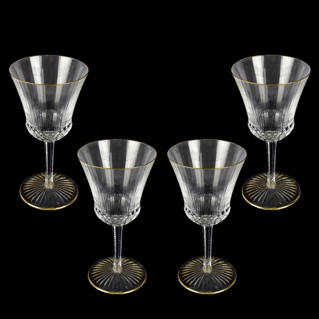 St Louis "Apollo" Wine Stems: Four French St Louis "Apollo" Pattern Crystal White Wine Stems. Etched mark to base. Measure 6-5/8" H, 3-1/4" W (at rim). Kodner Galleries offers phone and absentee bidding at a low, flat 21% buyer’