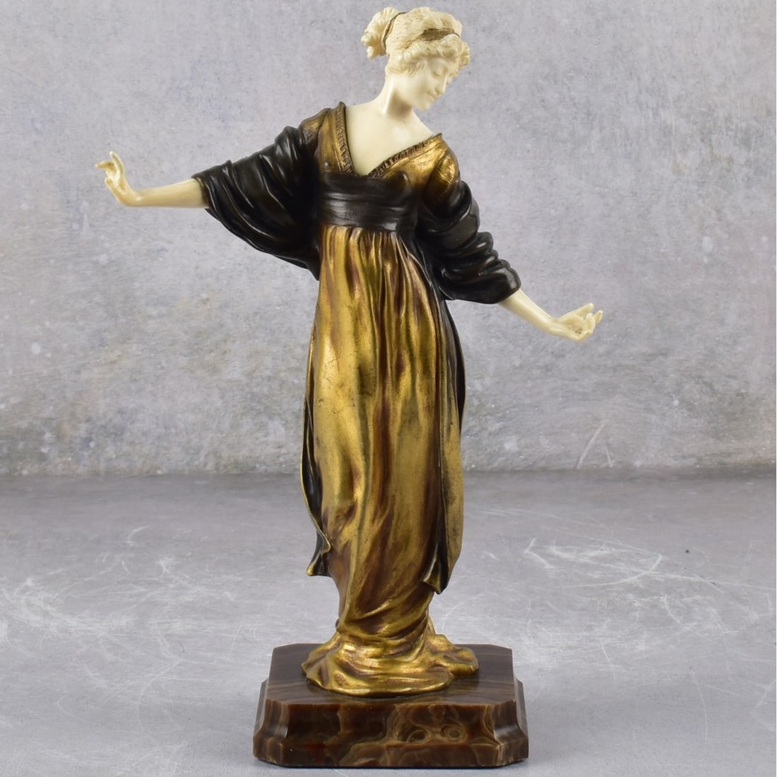 Paul Philippe, French (1870-1930): Paul Philippe, French (1870-1930) Art Nouveau Carved and Gilt Bronze Sculpture of Standing Lady Elegantly Dress. Mounted on an onyx base. Signed "P. Philippe" in the onyx base and marked "Lx106" to th