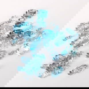 169.6CT TW Blue Topaz: Approx. 169.6 Carats TW Multi- Cut Natural London Blue Topaz (not mounted). Various sizes and saturation of color. Condition: Very good condition. For additional information and/or WhatsApp video plea