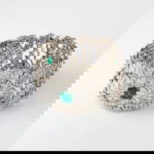 Art Deco Diamond and Emerald Bracelet: Stunning Very Fine Art Deco Diamond, Emerald and Platinum Wide Bracelet. Set with approx. 48.0 carat TW six hundred sixty old European and \baguette cut diamonds, F-G color, VVS-VS clarity and 8.0 car