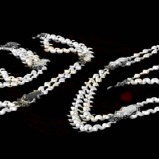 Baroque Pearl Necklace: Vintage Double Strand Baroque Pearl Necklace with Faux Gemstone and Gold Tone Metal Spacers. Pearls measure 10.5-12.0mm. Necklace measures 34" L. Kodner Galleries offers phone and absentee bidding at