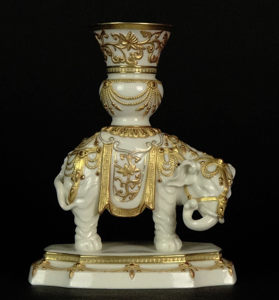 Antique Royal Worcester Gilt Ivory Porcelain Elephant w: Antique Royal Worcester Gilt Ivory Porcelain Elephant with Howdah. Green Mark (logo) and Impressed Mark to Base. Good Condition or Better. Measures 8-1/8 Inches Tall and 6-1/4 Inches Long. Shipping $6