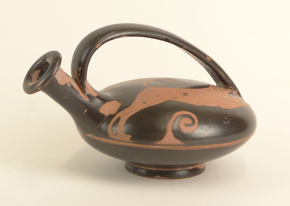 Antique Corinthian-style Pottery Vessel with Dog and Ha: Antique Corinthian-style Pottery Vessel with Dog and Hare Decoration. Unsigned. Small Crack, Chips and Losses to Surface Consistent with Age and Use Otherwise Good Condition. Measures 3-3/4 Inches Tal