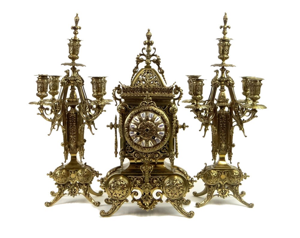 19th Century French Three (3) Piece Bronze Clock Set Wi: 19th Century French Three (3) Piece Bronze Clock Set With Garniture. Ornate Bronze Case with Matching Candelsticks. Clock with Porcelain Hour Markers. Clock Dial Unsigned. Movement Signed Cellier a Pa