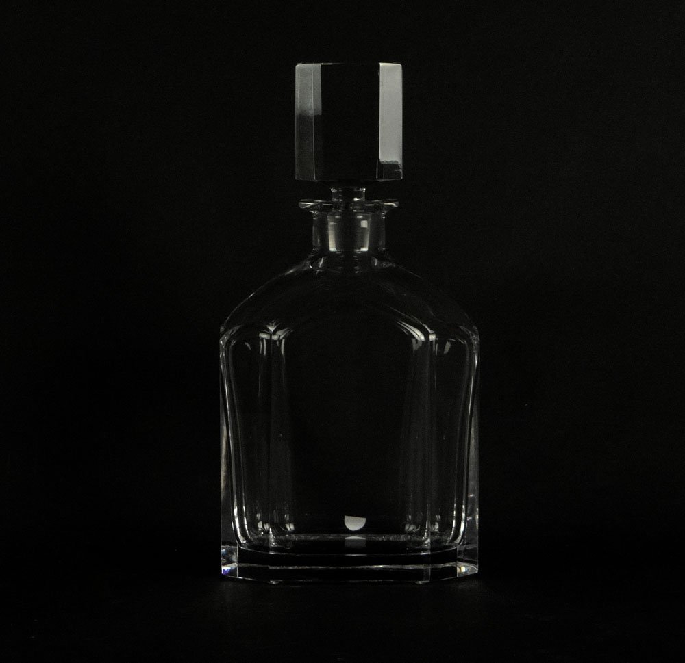 Vintage Orrefors Heavy Cut Crystal Decanter with Stoppe: Vintage Orrefors Heavy Cut Crystal Decanter with Stopper. Etched Signature and Paper Tag. Good to Very Good Condition. Measures 10-3/4 Inches Tall and 5-1/2 Inches Wide at Base. Shipping $48.00