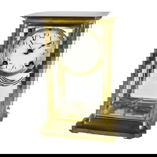 Antique Ansonia Mantle Clock: Antique Ansonia Brass and Glass Mantle Clock. Marked on the dial. Marked on the movement. Key and pendulum to accompany the lot. Measures 9" x 6" x 4-7/8". Kodner Galleries offers phone and absentee b