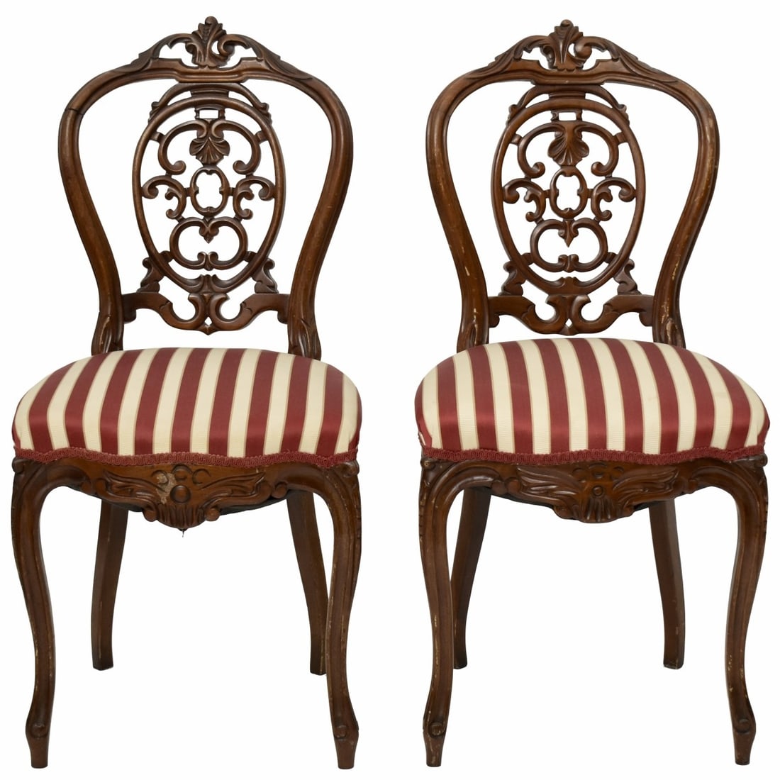 Antique Carved Wood Chairs: Pair of Antique Carved Wood Chairs with Upholstered Seats. Measures: 35" high, 16" wide, 15-1/2" deep, seat measures: 18" high. Kodner Galleries offers phone and absentee bidding at a low, flat 21% bu