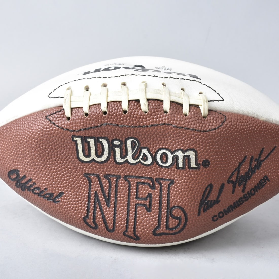 Dan Marino Autographed NFL Football w Team mates: Dan Marino Autographed NFL Wilson Football with 4 other teammates probably: B Parmalee #30, John Kidd #17, Tim Ruddy #61, Possibly Jason Taylor #99. Kodner Galleries offers phone and absentee bidding 