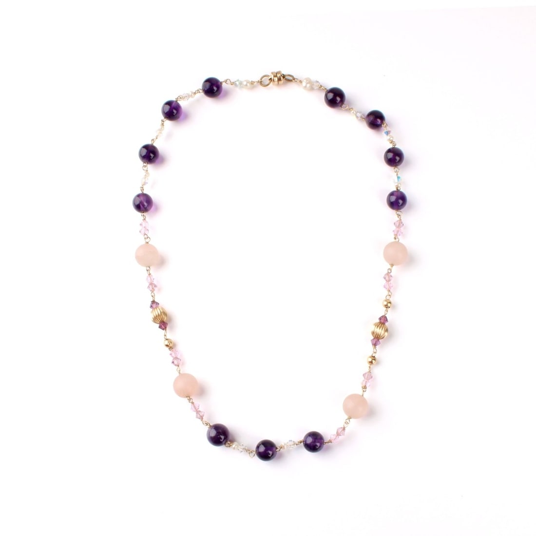 Amethyst, Quartz, Pearl and 14K Necklace: Vintage Amethyst, Rose Quartz, Small Crystal, Pearl and 14 Karat Yellow Gold Beaded Necklace with Later Magnetic clasp. Rose quartz beads measure 10mm. Necklace measures 17" L. Approx. weight: 20.84 g
