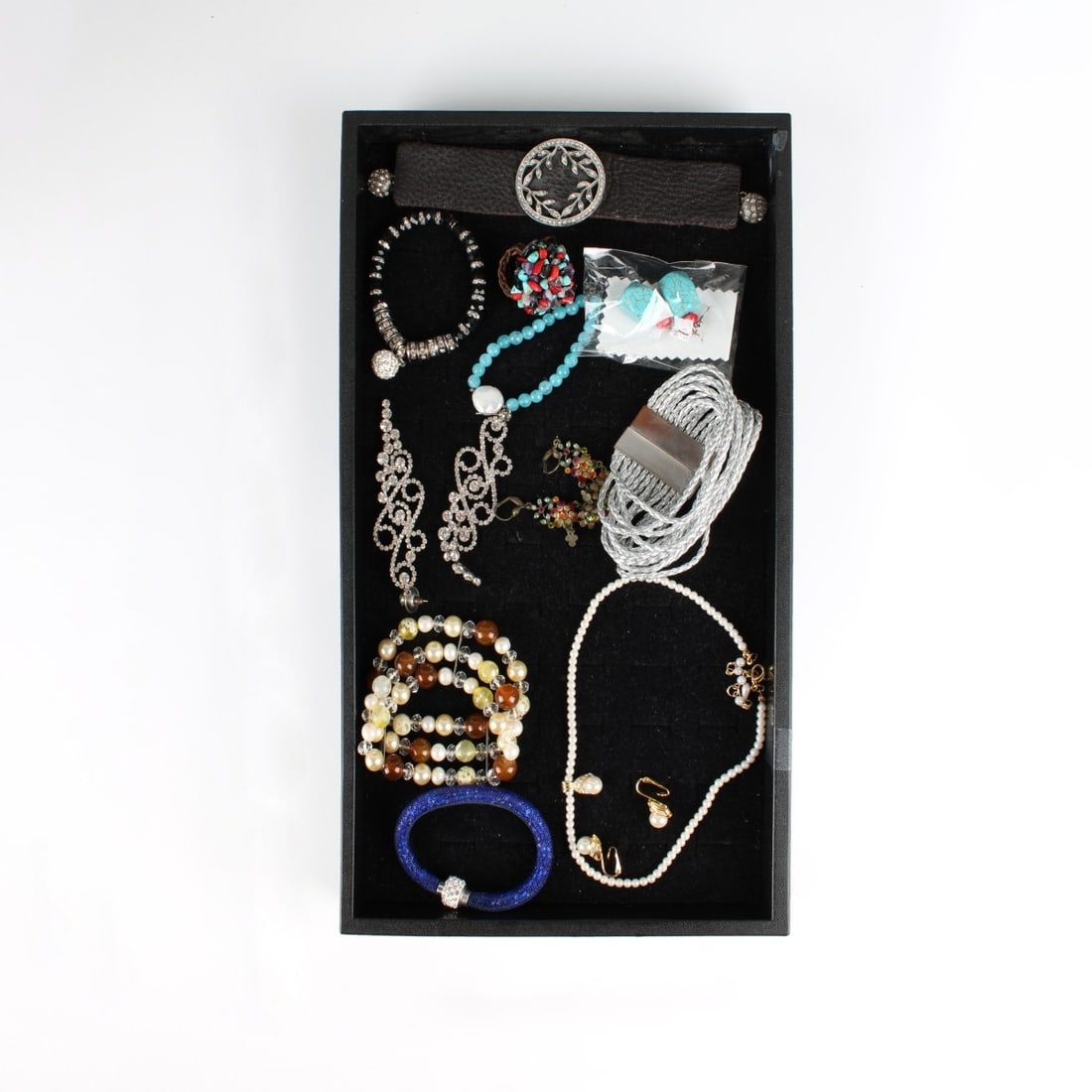 Collection of Vintage Costume Jewelry: Collection of Vintage Costume Jewelry Including Necklaces, Bracelets, Watches, Earrings. A few signed pieces. Kodner Galleries offers phone and absentee bidding at a low, flat 21% buyer’s premium wi