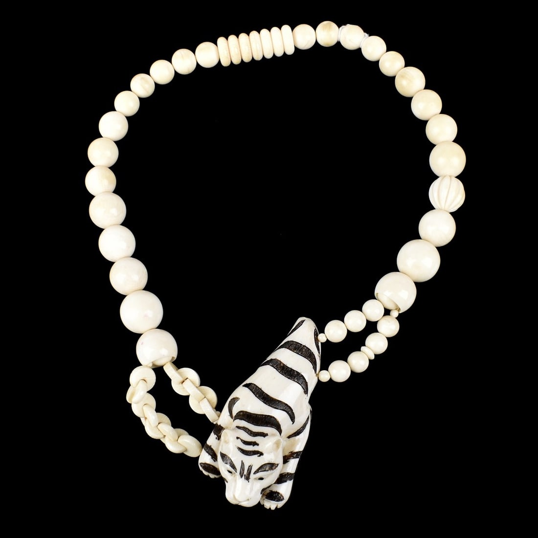 Japanese Graduated Beaded Necklace: Japanese 10mm - 15.5mm Graduated Beaded Necklace with Polychrome Carved Tiger Pendant. Pendant measures 3" x 1-3/8". 17-1/4". We Will Not Ship This Item Out of State of Florida. Anyone Having This Ite
